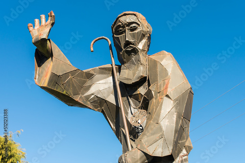 Sao Francisco de Paula, Brazil - Circa June 2022: Monument of Sao Francisco de Paula (St Francis of Paola) made of metal parts, located near the main church photo