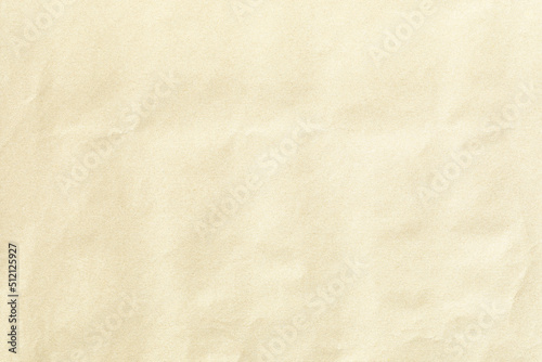 Crumpled brown background paper sheet texture