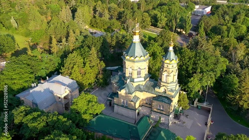 Orbit aerial footage of Lazarus church (Lazarevskaya church, 1902) on sunny summer day. Pyatigorsk, Stavropol Krai, Caucasus, Russia. photo