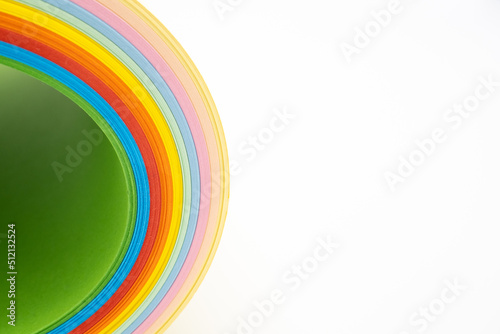 Abstract background with rainbow colored paper, rich shades, white background