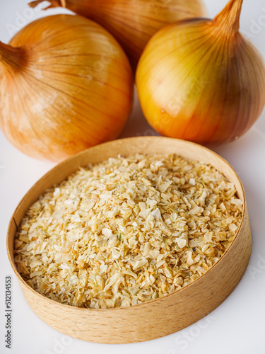 dried onions on a white acrylic background