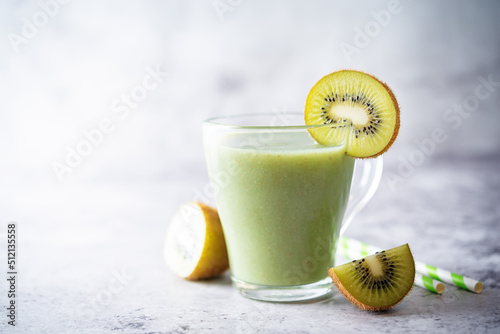Fresh green healthy kiwi smoothie in a glass