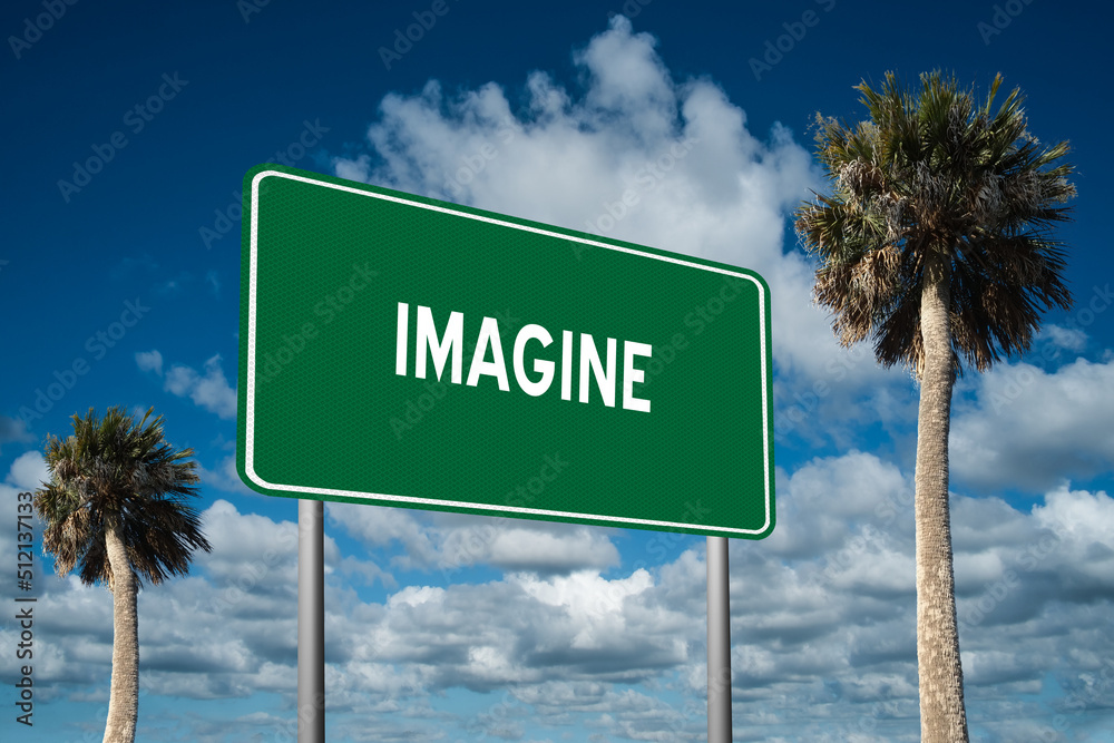 Fototapeta premium Highway sign with the word Imagine on a beautiful blue sky background with palm trees. Motivational concept for finding what we want on the journey of life.