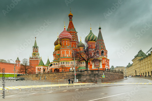 Beautiful view of Moscow Red Square Kremlin towers. Moscow architecture, Russia - in a cloudy weather. It is world famous tourist spot - Saint Basil's cathedral in background.