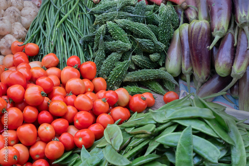Tomato and other vegetables for sale in a market in Territy Bazar, Kolkata, West Bengal, India.