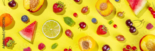Fototapeta Naklejka Na Ścianę i Meble -  Summer vitamin food concept, various fruit and berries watermelon peach mint plum apricots blueberry strawberry currant, creative flat lay on yellow background top view copy space