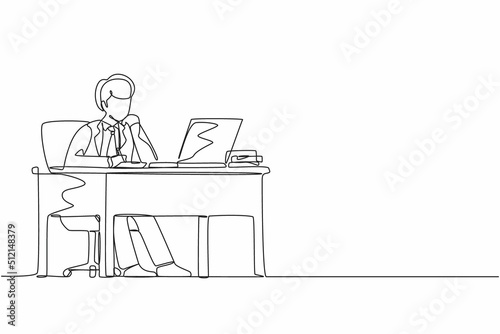 Single continuous line drawing businessman writing sitting in front of laptop at table. Young male studying and writing in notebook, at desk in front of computer. One line draw graphic design vector