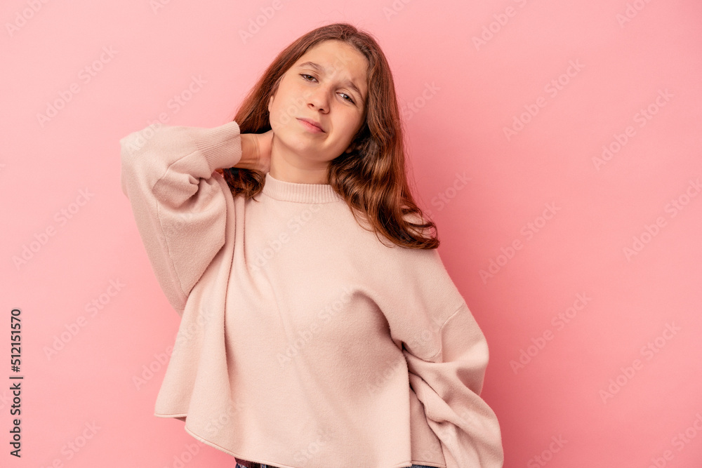 Little caucasian girl isolated on pink background massaging elbow, suffering after a bad movement. Little caucasian girl isolated on pink background massaging elbow, suffering after a bad movement.