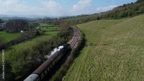 Aerial view of a steam train in the English countryside