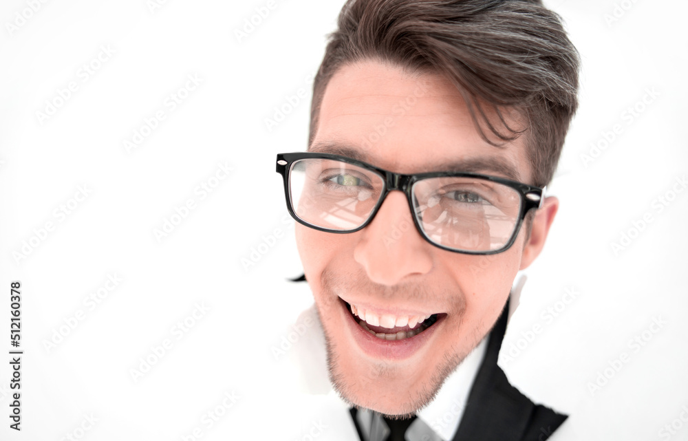 confident businessman breaking through a white paper wall confident businessman breaking through a white paper wall