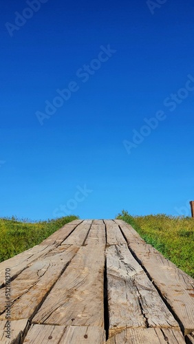 wooden bridge over sky