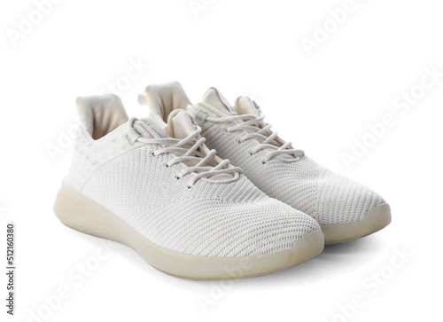 Pair of stylish sneakers on white background