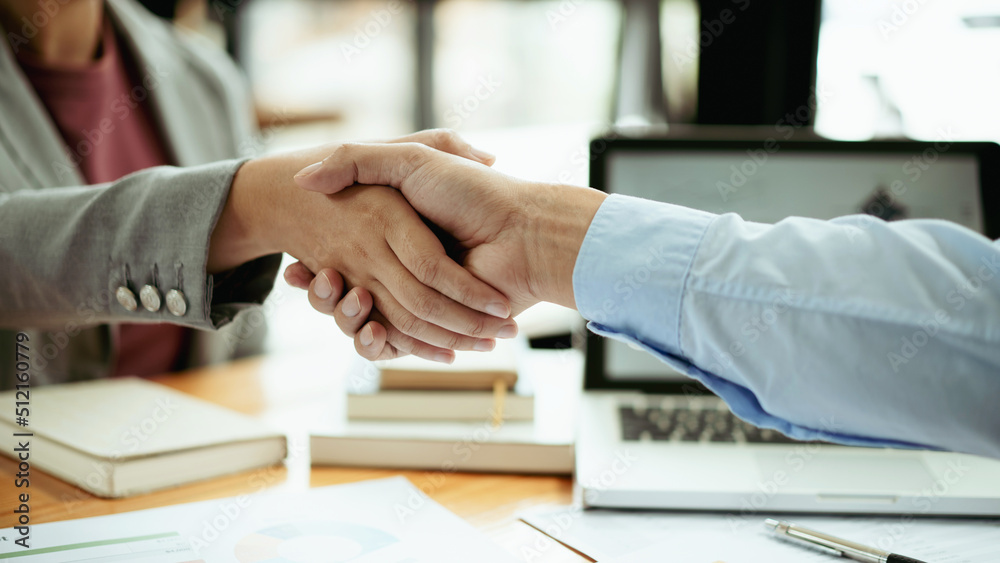 Teamwork executives colleagues business people handshake after meeting.