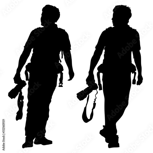 A full-length male photographer walks forward, carries a camera in his right hand, looks to the right. Vector black silhouettes isolated on white background. 2 options