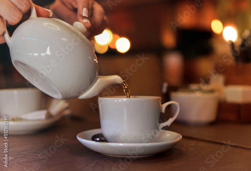 Fotografie White cup with teapot