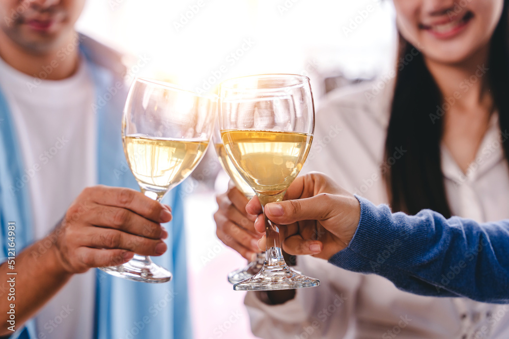 Bravo! group of young people clinking glasses Cheerful enjoying food and drink while together in the office. Focus on the glass. Bravo! group of young people clinking glasses Cheerful enjoying food and drink while together in the office. Focus on the glass.