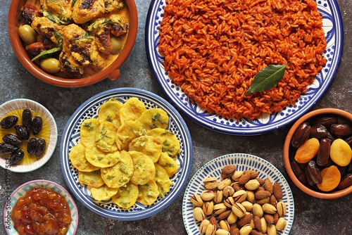 Jollof Rice. Potato Bhaja. Chicken Curry. Traditional African dishes. Flat layot