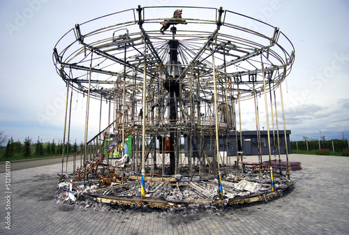 Arboretum Dobropark, Kyiv region, Ukraine. Carousel destroyed by Russian troops. photo