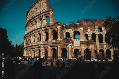 People walking through the roman colosseum