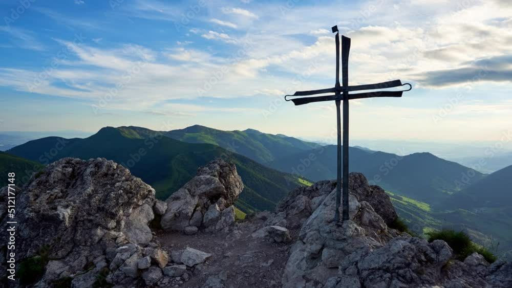 Christian cross on the top of Limestone Mountain, panoramic view of the mountain ridge.Timelapse 4K Christian cross on the top of Limestone Mountain, panoramic view of the mountain ridge.Timelapse 4K