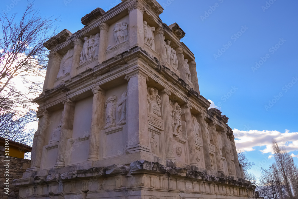 Fototapeta premium Relic decorated with historical symbols. Historical building from ancient times.