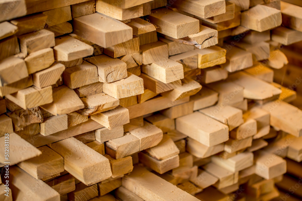 Warehouse wood closeup. At the sawmill plant wooden blanks for furniture and construction.