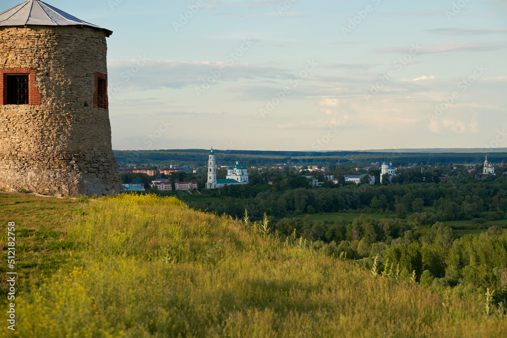 A fragment of an ancient stone fortress tower 