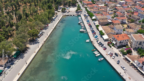 Aerial drone photo from famous and picturesque port of traditional historic village of Galaxidi, Fokida, Greece © aerial-drone