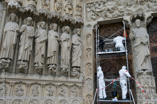 Restoration of the doors of a cathedral, Notre Dame, Paris, Ile-de-France, France photo