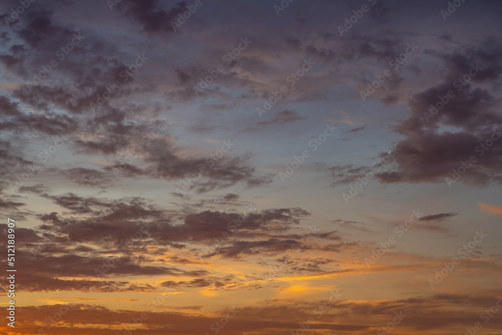 Dramatic sunset sky, cloudscape with colorful twilight clouds 