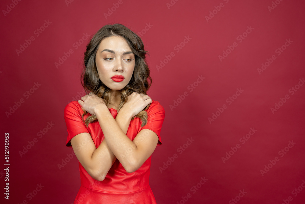 Woman frustrated on a red background Woman frustrated on a red background