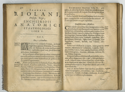 фотографія Weathered and old latin book