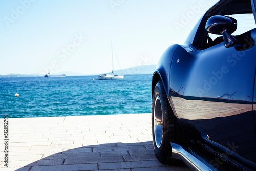 real old fashion cabriolet car at seaside touristic view lifestyle