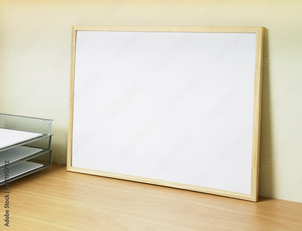 Close up of blank whiteboard resting on desk Close up of blank whiteboard resting on desk