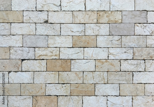 Floor made with marble and and light colored stone bricks