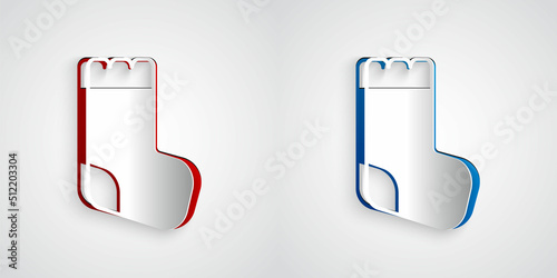 Paper cut Baby socks clothes icon isolated on grey background. Paper art style. Vector