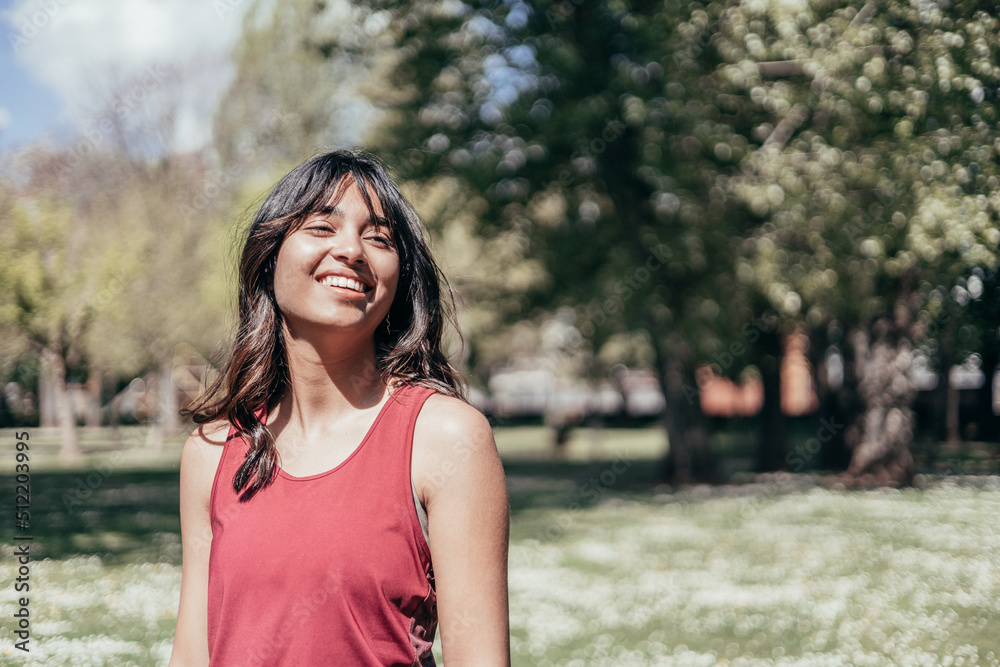 beautiful young indian woman outdoors and copy space beautiful young indian woman outdoors and copy space