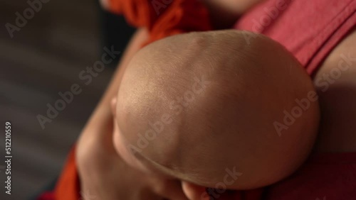 A moving fontanel on a small child's head with visible pulse photo