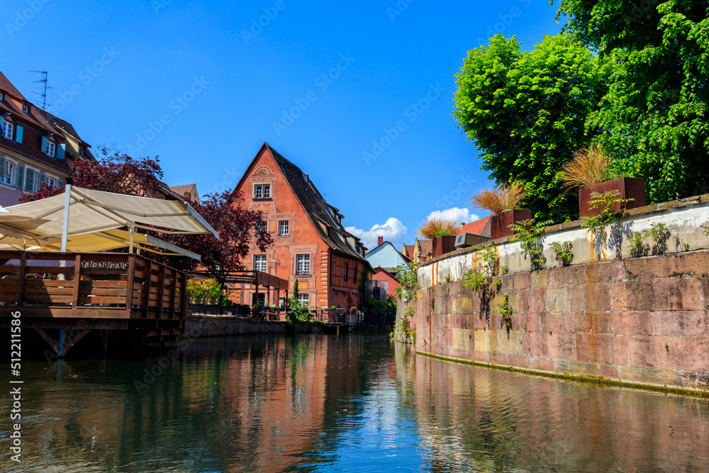 Traditional colourful half-timbered houses alongside the Lauch river in Little Venice district in Colmar, Alsace, France