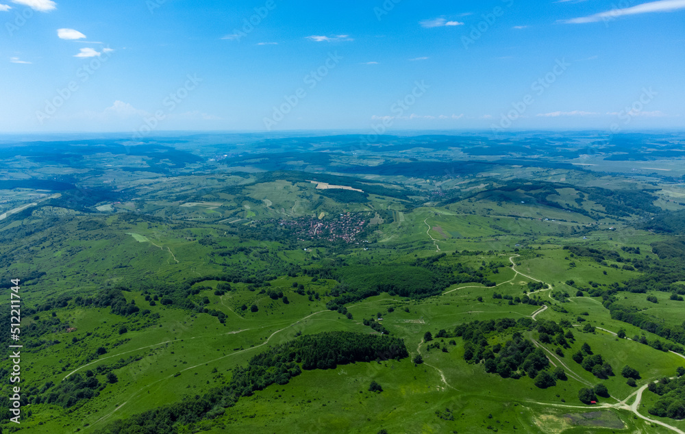 Aerial landscape with fields and forests in Transylvania in summer
