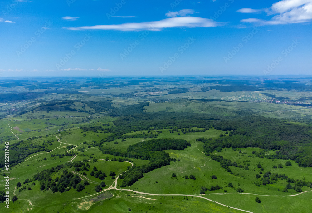 Aerial landscape with fields and forests in Transylvania in summer
