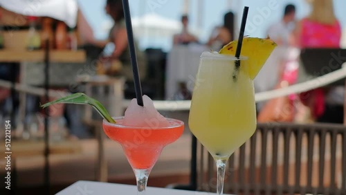 Close up of two cocktails. Pina colada cocktail and watermelon cocktail.
