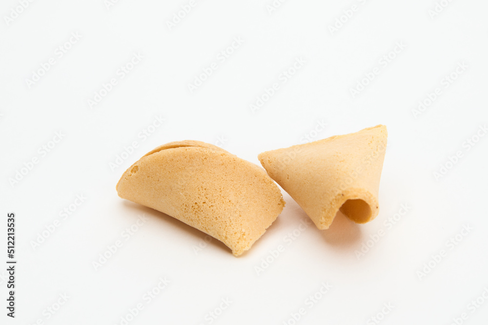 broken fortune cookie isolated on white 