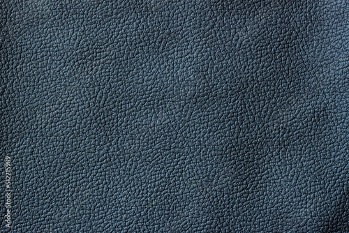 Texture of dark genuine leather close-up, granular texture © svetlanais
