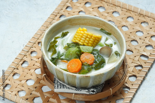 Sayur lodeh or vegetables with coconut milk soup is traditional Indonesian culinary food from Java photo