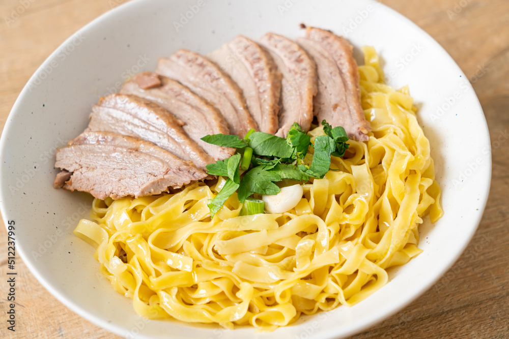 dried duck noodles in white bowl dried duck noodles in white bowl