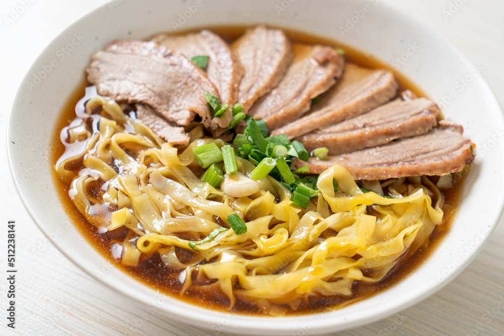 egg noodles with stewed duck in brown soup egg noodles with stewed duck in brown soup