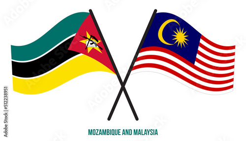 Mozambique and Malaysia Flags Crossed And Waving Flat Style. Official Proportion. Correct Colors.
