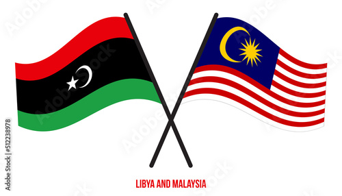 Libya and Malaysia Flags Crossed And Waving Flat Style. Official Proportion. Correct Colors.
