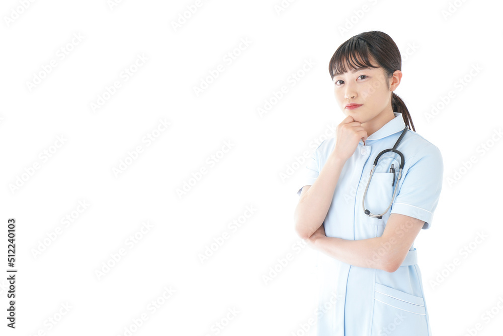 Young nurse thinking something at hospital Young nurse thinking something at hospital
